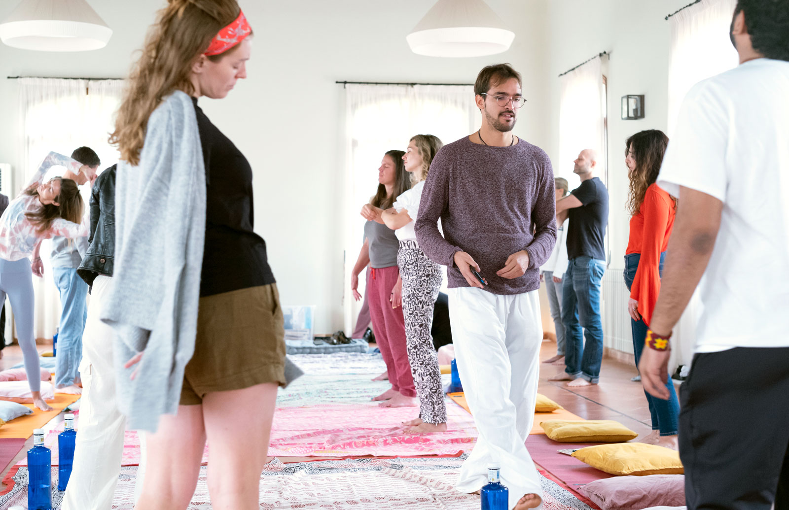 Group workshop session with Nicolás guiding participants through an embodied practice
