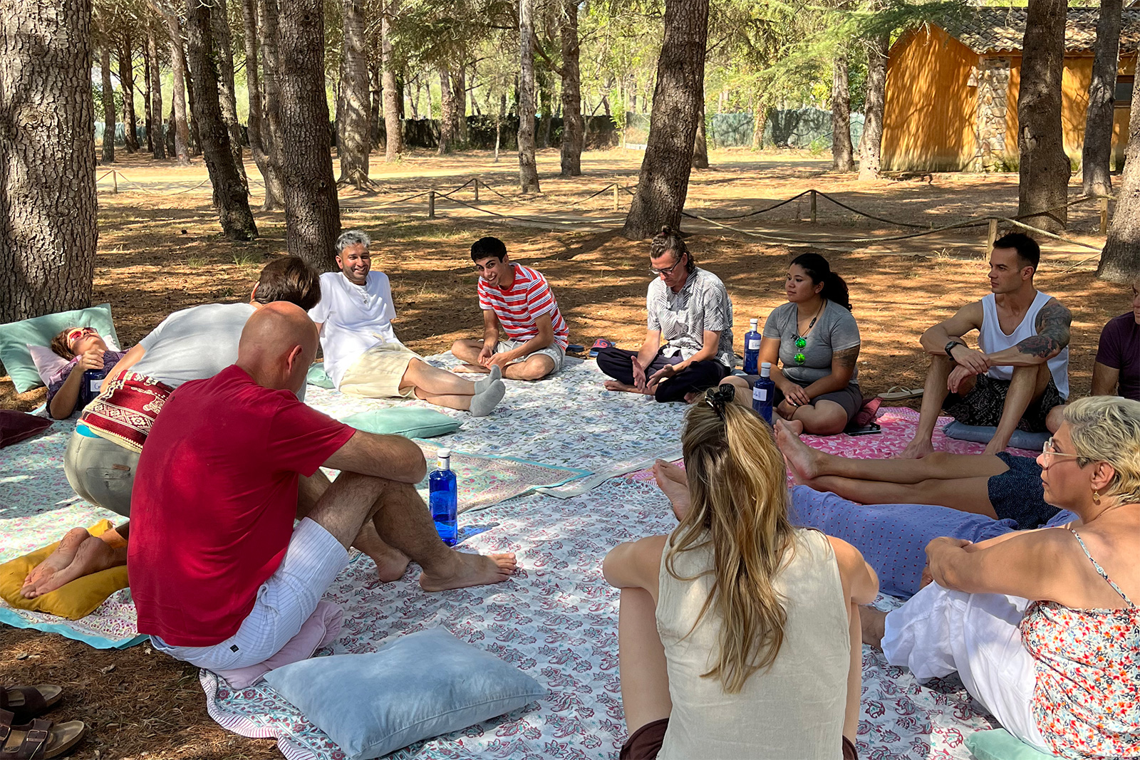 Group workshop session outdoors at Conscious Intimacy Center